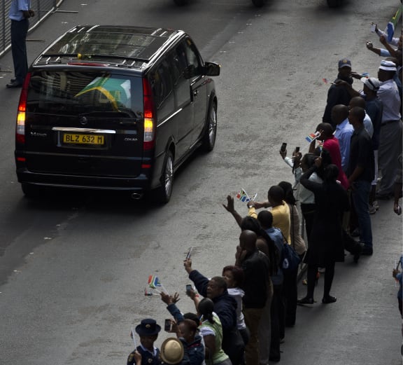 People lined the streets in Pretoria for a last farewell.