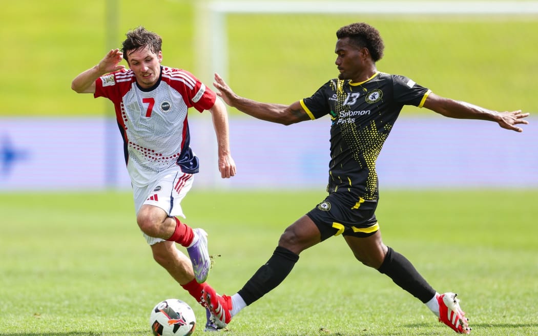 Mathis Lacan of Tahiti United (left) and Ben Fox of Solomon Kings FC during the team's OFC Pro League 2026, clash at the North Harbour Stadium in Auckland, on Saturday. Photo: Joshua Devenie / www.phototek.nz