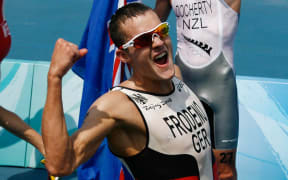 Jan Frodeno wins the triathlon at the 2008 Beijing Olympic Games.