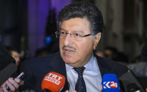 High Negotiations Committee (HNC) spokesman Salem al-Meslet (Syria's main opposition body ) speaks to the media upon his arrival in Geneva.