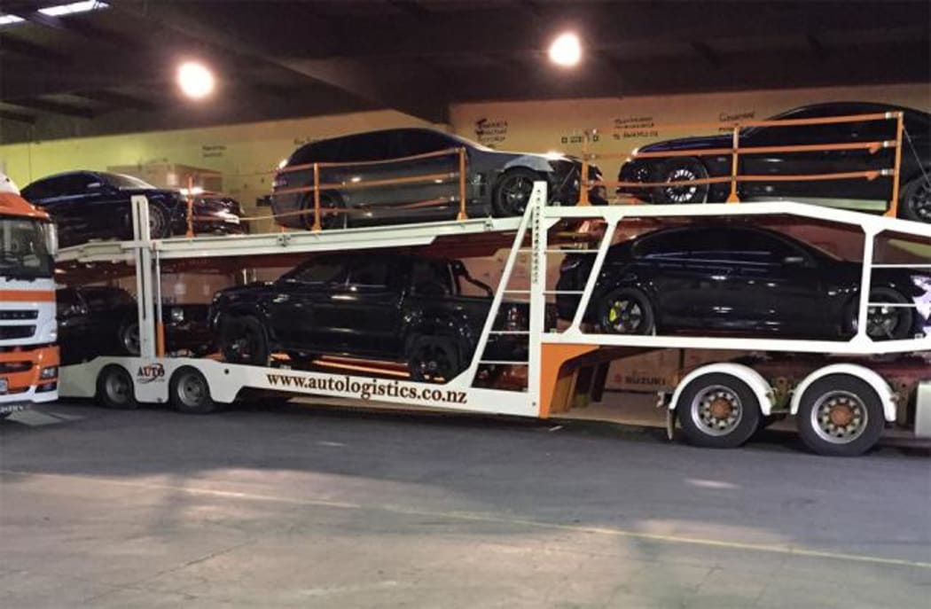 Vehicles seized in the bust.