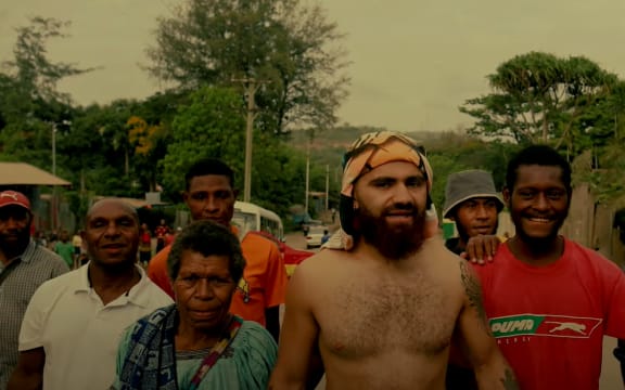 Vallé with friends and family in Papua New Guinea