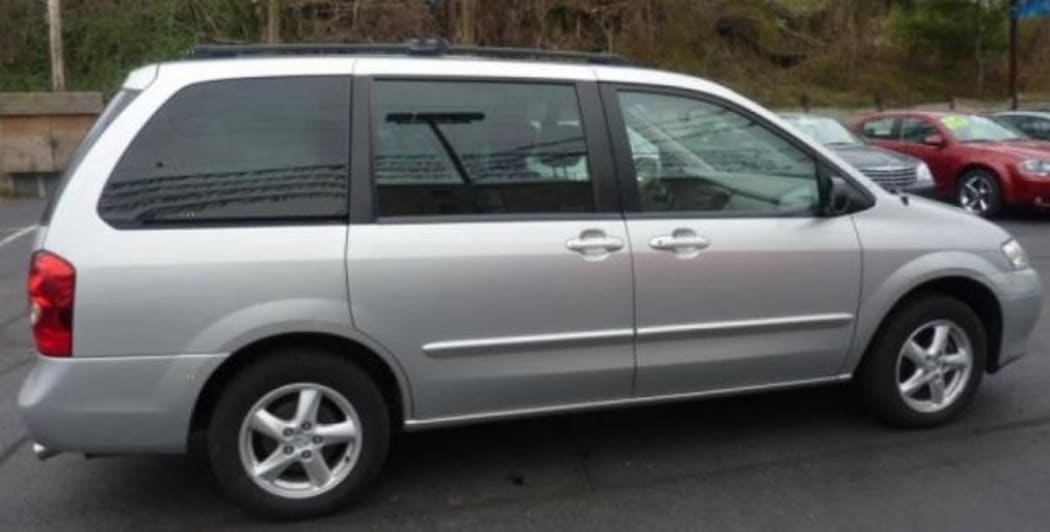 Police are seeking sightings of a silver Mazda MPV vehicle - reg HTW761 - similar to this vehicle
