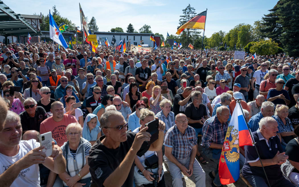 Several hundred people gathered to call for the commissioning of Nord Stream 2 - a new pipeline which was about to go online but was blocked by the German government after the invasion - on 4 September, 2022.