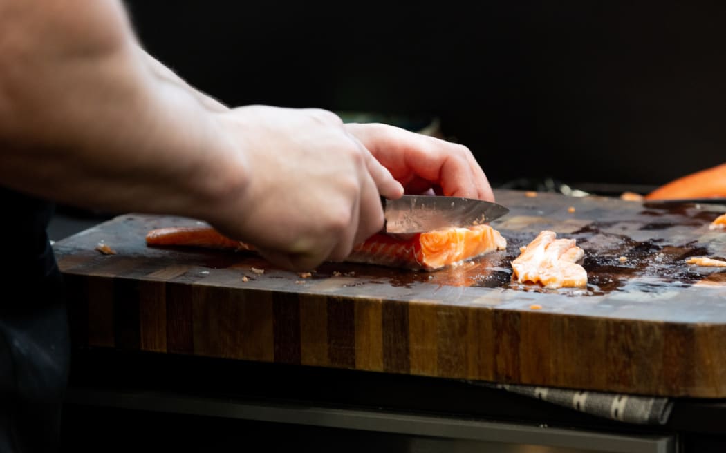 Salmon being cut for the Outstanding food producer awards juding.