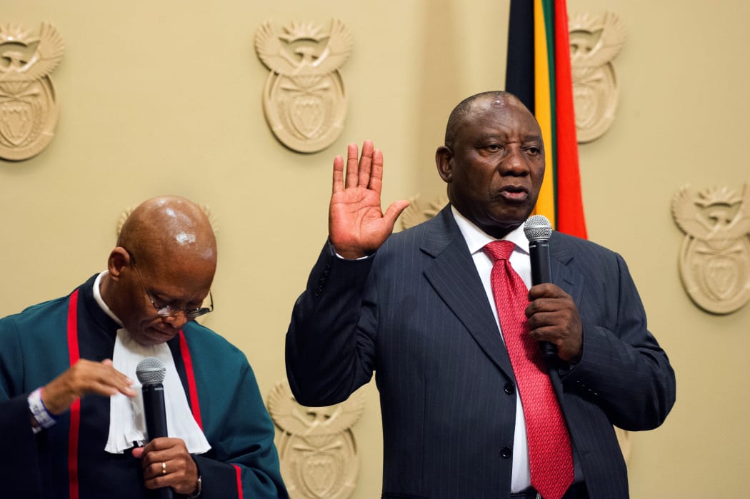 South Africa's new president Cyril Ramaphosa is sworn into office by South Africa's Chief Justice Mogoeng Mogoeng