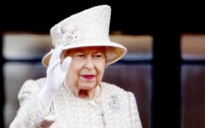 Queen Elizabeth IIat the balcony of Buckingham Palace in London, on June 08, 2019, after attending Trooping the Colour at the Horse Guards Parade, the Queens birthday parade