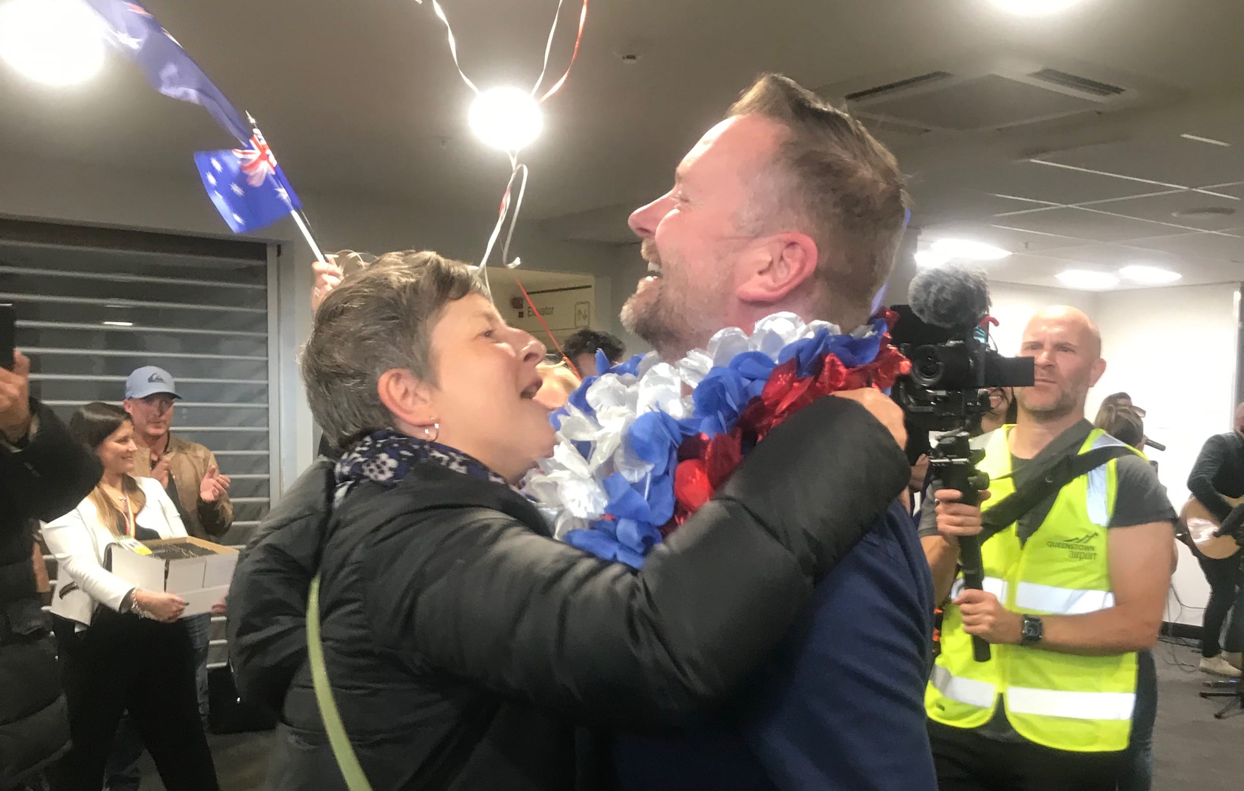 An emotional reunion as loved ones greet each other at Queenstown Airport