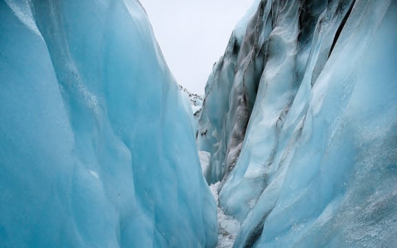 View while hiking through a carved out crevice on Fox Glacier, New Zealand