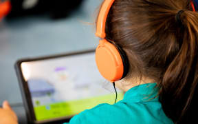 Primary student in a classroom.