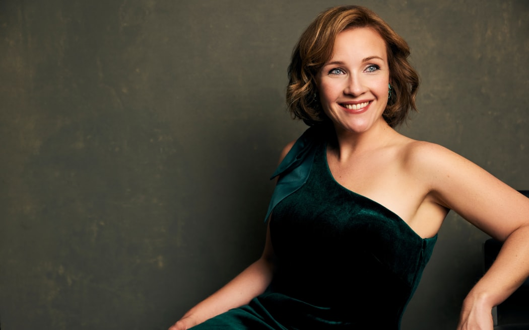 Sasha Cooke in a green dress.