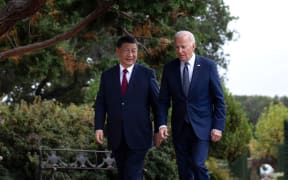 US President Joe Biden (R) and Chinese President Xi Jinping walk together after a meeting during the Asia-Pacific Economic Cooperation (APEC) Leaders' week in Woodside, California on November 15, 2023. Biden and Xi will try to prevent the superpowers' rivalry spilling into conflict when they meet for the first time in a year at a high-stakes summit in San Francisco on Wednesday. With tensions soaring over issues including Taiwan, sanctions and trade, the leaders of the world's largest economies are expected to hold at least three hours of talks at the Filoli country estate on the city's outskirts.