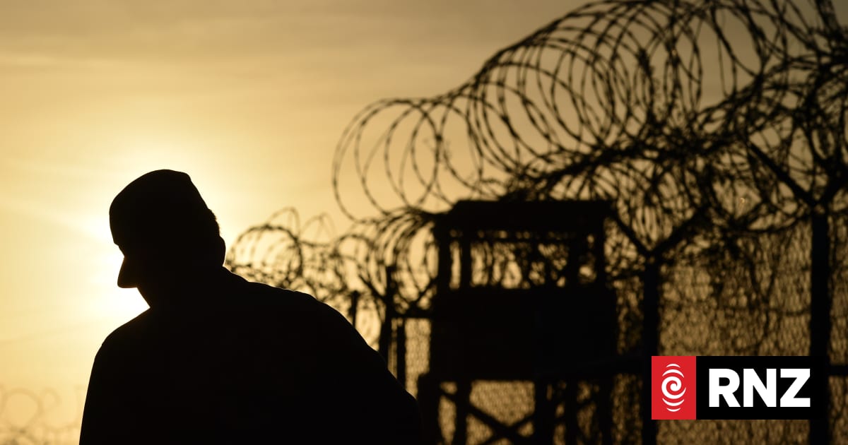 US flights carrying detained migrants to Guantanamo 'under way' | RNZ