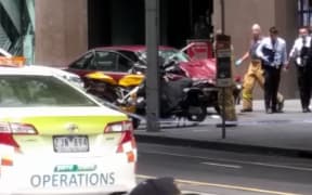 Police in Melbourne have arrested a man after a car hit pedestrians in the city centre, killing three people and injuring at least 20.