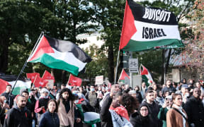 Canada, Montreal, 2023-10-08. Demonstration against Israel occupation of Palestine, hundreds of people march toward Israeli consulate to protest against the occupation of Palestine after recent events, Hamas attack, Israel Gaza conflict. Photograph by Bastien Durand / Hans Lucas. Canada, Montreal, 2023-10-08. Manifestation contre l occupation de la Palestine par Israel, des centaines de manifestants marchent vers le consulat d Israel pour protester contre l occupation de la Palestine apres les recents evenements, Attaque du Hamas, conflit entre Israel et Gaza. Photographie par Bastien Durand / Hans Lucas (Photo by Bastien Durand / Hans Lucas / Hans Lucas via AFP)