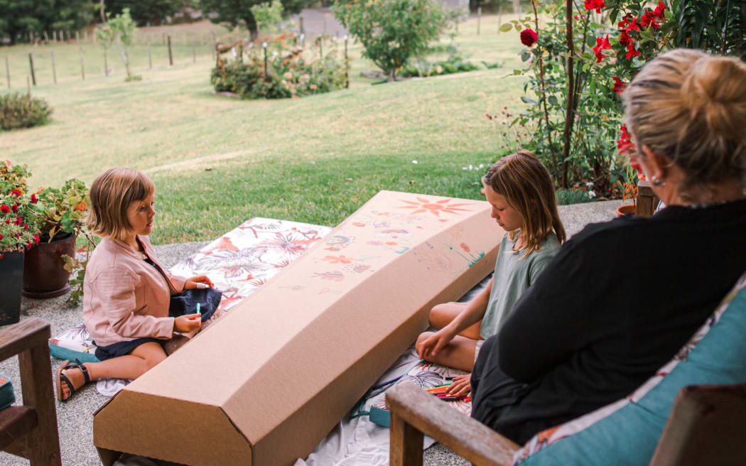 An outside the box casket, as designed by Becs Bartells.