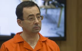 Former Michigan State University and USA Gymnastics doctor Larry Nassar appears in court for his final sentencing phase in Eaton County Circuit Court in Charlotte, Michigan.