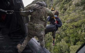 A no. 3SQN NH90 Helicopter assists NZ Police and LandSAR with a search and rescue operation to find two missing trampers - Dion Reynolds and Jessica O'Connor - in the Kahurangi National Park.