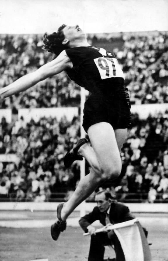 Yvette Williams jumps her way to an Olympic Gold medal with a jump of 6.24m. Helsinki Olympic Games, 1952.