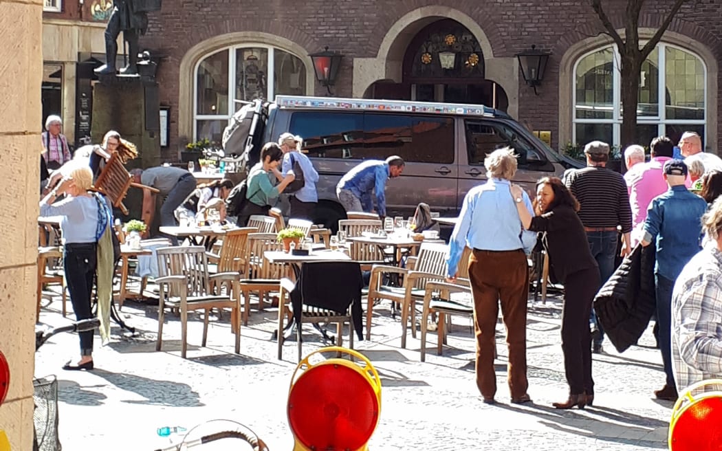 The scene where several people were killed and injured when a vehicle ploughed into pedestrians at a cafe in Muenster, western Germany.