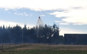 Water being dropped on a scrub fire in Canterbury on Saturday 1 June 2024.