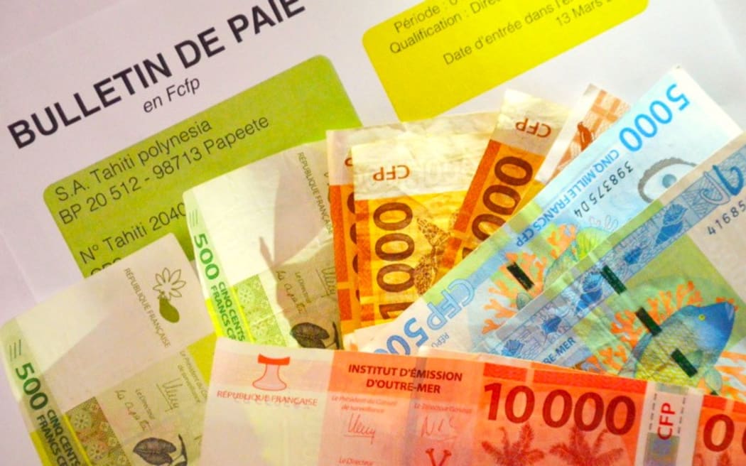 Payslip and French Pacific Francs - Minimum wage increase in French Polynesia - Photo supplied