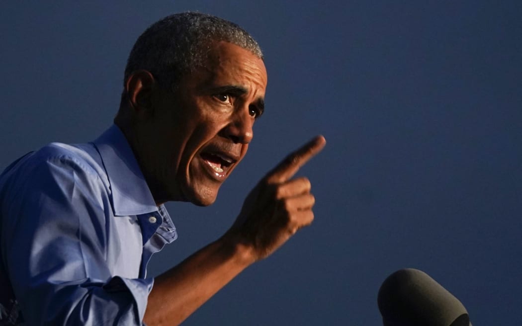 Former US President Barack Obama addresses Biden-Harris supporters during a drive-in rally in Philadelphia, Pennsylvania on October 21, 2020. -