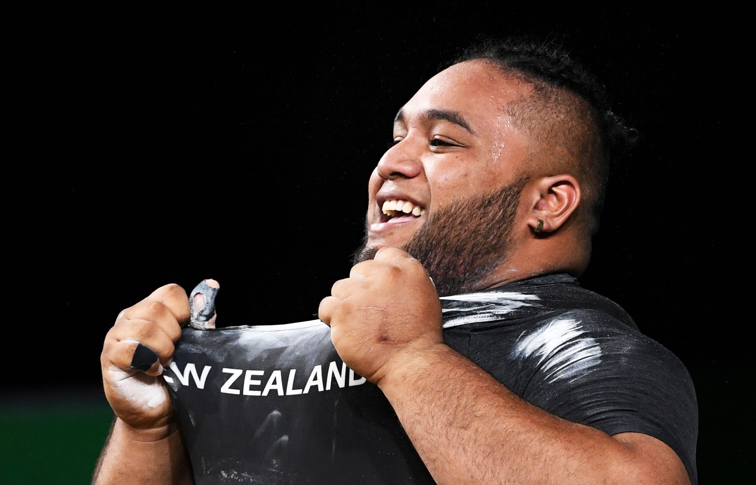 Weightlifter David Liti after winning gold at the Commonwealth Games.