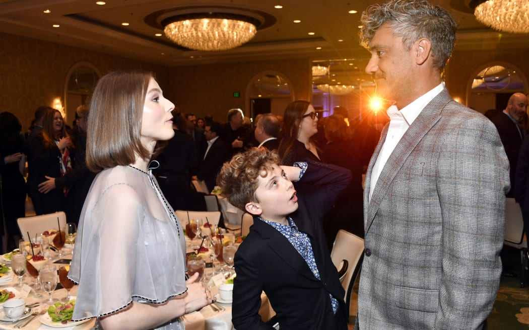 LOS ANGELES, CALIFORNIA - JANUARY 03: (L-R) Actor Thomasin McKenzie, actor Roman Griffin Davis, and director-actor Taika Waititi attend the 20th Annual AFI Awards at Four Seasons Hotel Los Angeles at Beverly Hills on January 03, 2020 in Los Angeles, California.