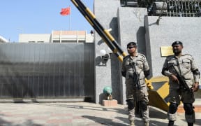 Pakistani rangers stand in front of the Chinese consulate after an attack in Karachi on November 23, 2018.
