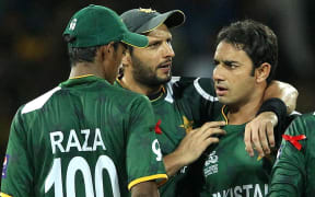 Saeed Ajmal celebrates the wicket of Jeewan Mendis during the ICC World Twenty20 semi final match between Sri Lanka and Pakistan in Colombo. 2012.
