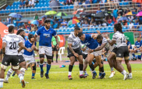 The Flying Fijians putting in some defense work against Manu Samoa at Apia Park on Saturday. 29 July 2023 Photo: Piui Simi/Samoa Observer