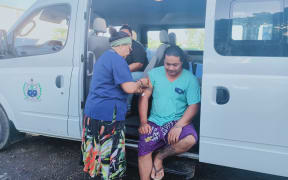 A nurse administers a shot during the mass vaccination campaign