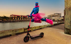 Choreographer Malia Johnston has designed a 'roaming ballet' on Flamingo Scooters at the Wellington Waterfront.
