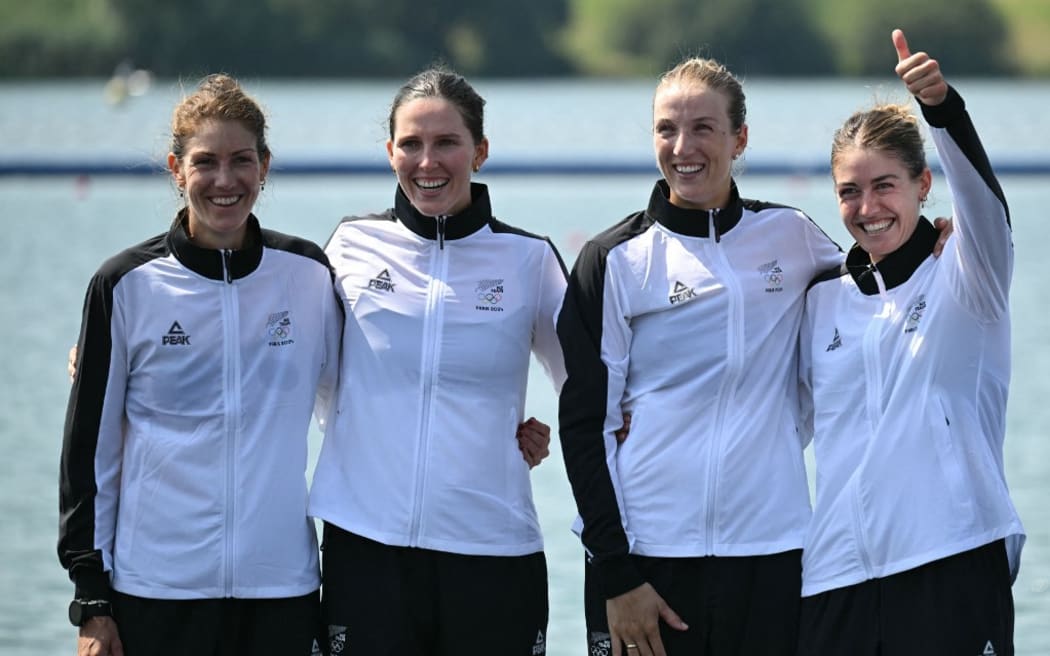 New Zealand's bronze medallists Jackie Gowler, Phoebe Spoors, Davina Waddy and Kerri Williams pose on the podium during the medal ceremony after the women's four final rowing competition at Vaires-sur-Marne Nautical Centre in Vaires-sur-Marne during the Paris 2024 Olympic Games on August 1, 2024. (Photo by Bertrand GUAY / AFP)