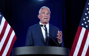 Independent presidential candidate Robert F. Kennedy Jr. speaks in Phoenix, Arizona, August 23, 2024. Robert F. Kennedy Jr, scion of America's storied political clan, suspended his long shot presidential bid on August 23, 2024 and endorsed Donald Trump, injecting a new dose of uncertainty into the White House race. (Photo by Olivier Touron / AFP)