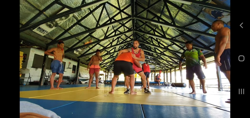 Ilai Ualesi Elekana Manu hosted a wrestling workshop in Apia during the Pacific Games.