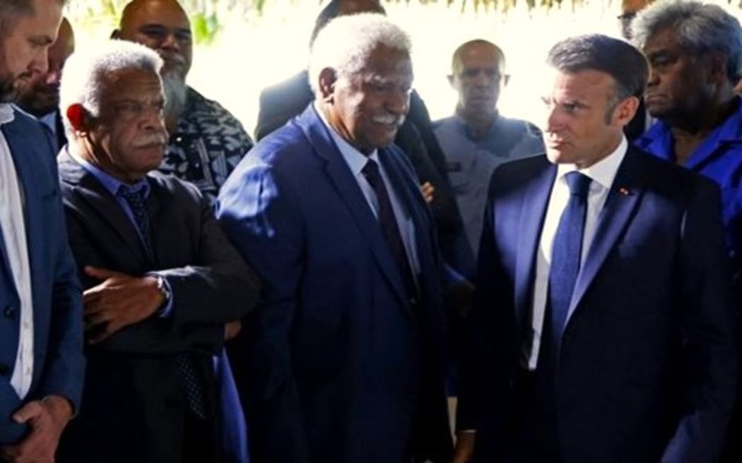 Macron [right] with New Caledonia’s President Louis Mapou [left] and Congress President Roch Wamytan [centre] – Photo supplied pool