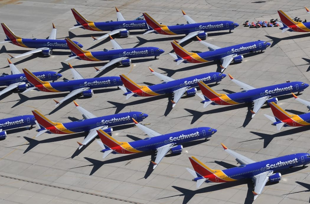 (FILES) In this file photo taken on March 28, 2019 Southwest Airlines Boeing 737 MAX aircraft are parked on the tarmac after being grounded, at the Southern California Logistics Airport in Victorville, California.