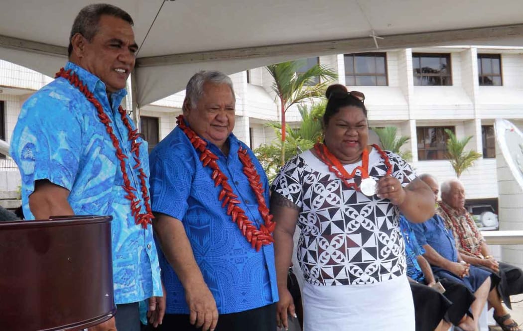 Prime Minister Tuila'epa Sailele Malielegaoi, Minister of Sports and Culture, Loau Keneti Sio, and Samoa's first Olympic medalist, Ele Opeloge.