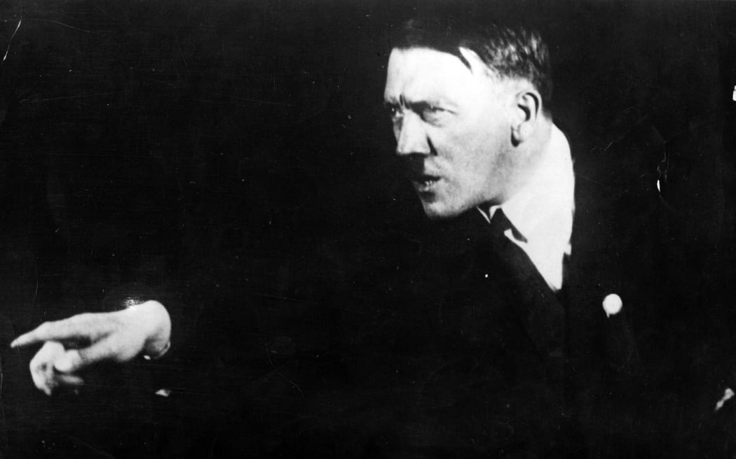 Adolf Hitler rehearsing a speech in front of the mirror, in 1933.