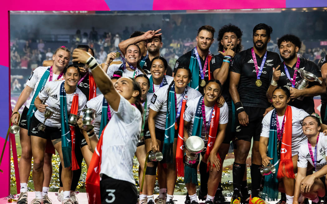 New Zealand men’s and women’s team celebrate after winning their cup final matches at the Hong Kong Sevens.