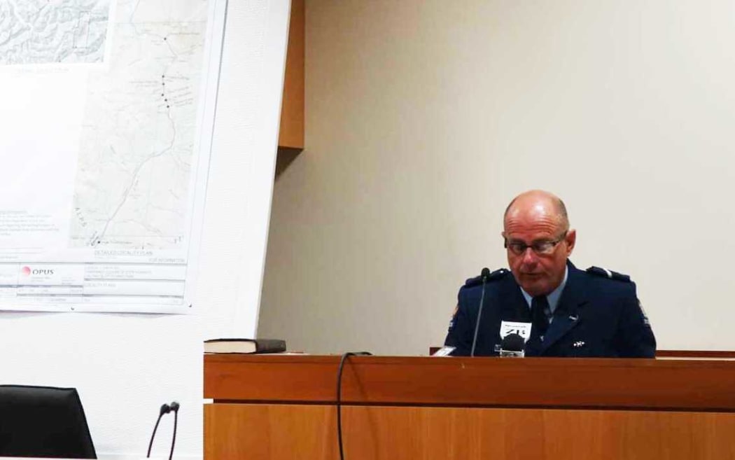 Senior Constable Simon Burbery gives evidence at the inquest into the deaths of a Canadian couple.