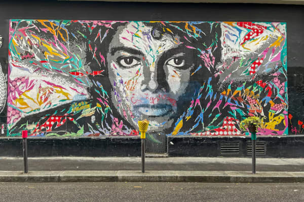 A colourful mural of Michael Jackson's face.