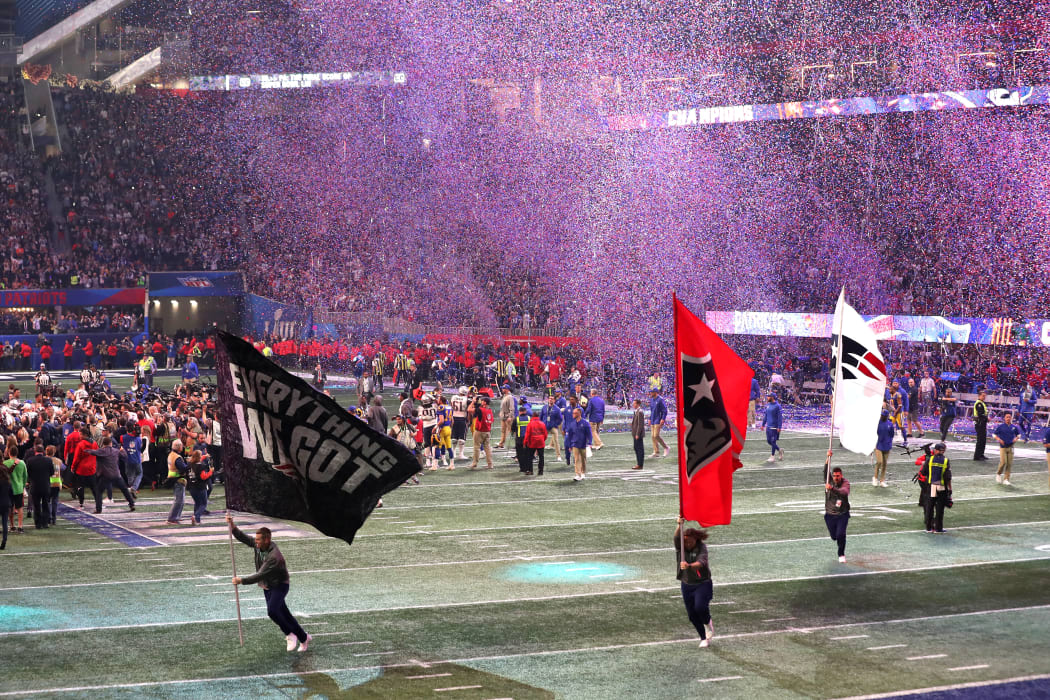 ATLANTA, GEORGIA - FEBRUARY 03: The New England Patriots celebrate their 13-3 win in Super Bowl LIII against the Los Angeles Rams at Mercedes-Benz Stadium on February 03, 2019 in Atlanta, Georgia.   Streeter Lecka/Getty Images/AFP