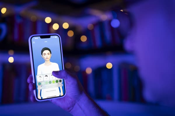 This illustration photo shows a user interacting with a smartphone app to customize an avatar for a personal artificial intelligence chatbot, known as a Replika in Warsaw, Poland on 22 July, 2023.