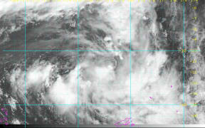 Cyclone Mona forms in the South Pacific on Thursday. It is forecast to intensify in the coming days and head south to Fiji (bottom pink outline).