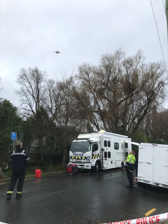 Police use a drone at the scene of the fatal stabbing.