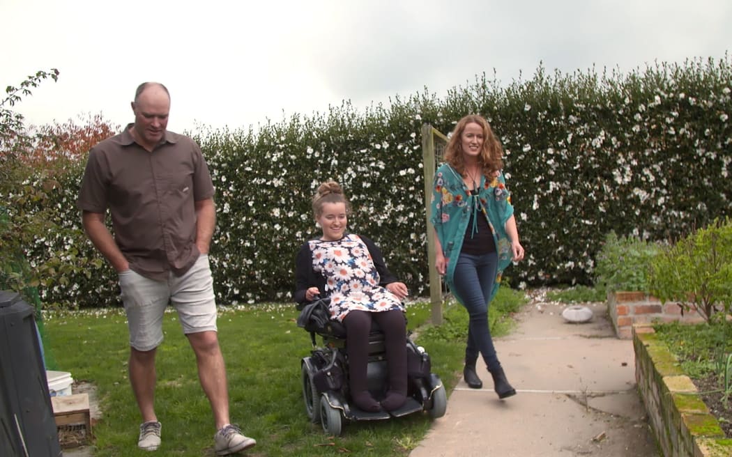 Stella Beswick with her parents.