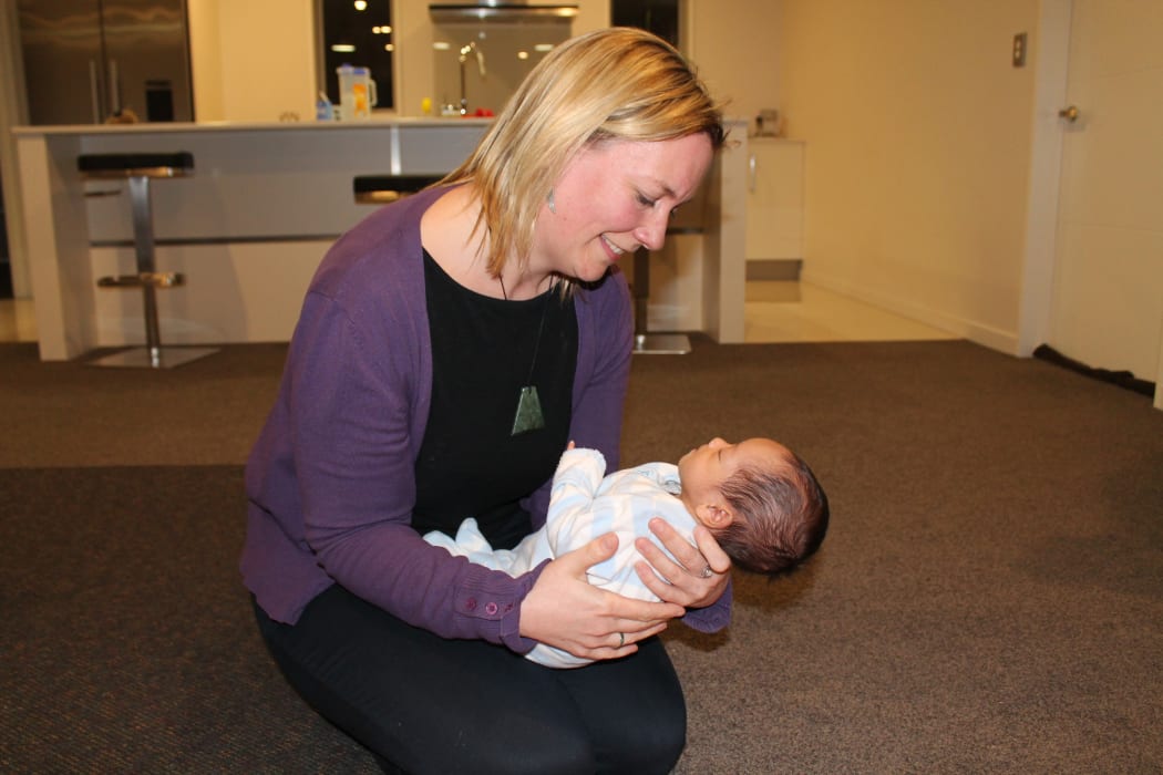 A photo Christchurch Midwife, Cara Meredith with baby Sondra